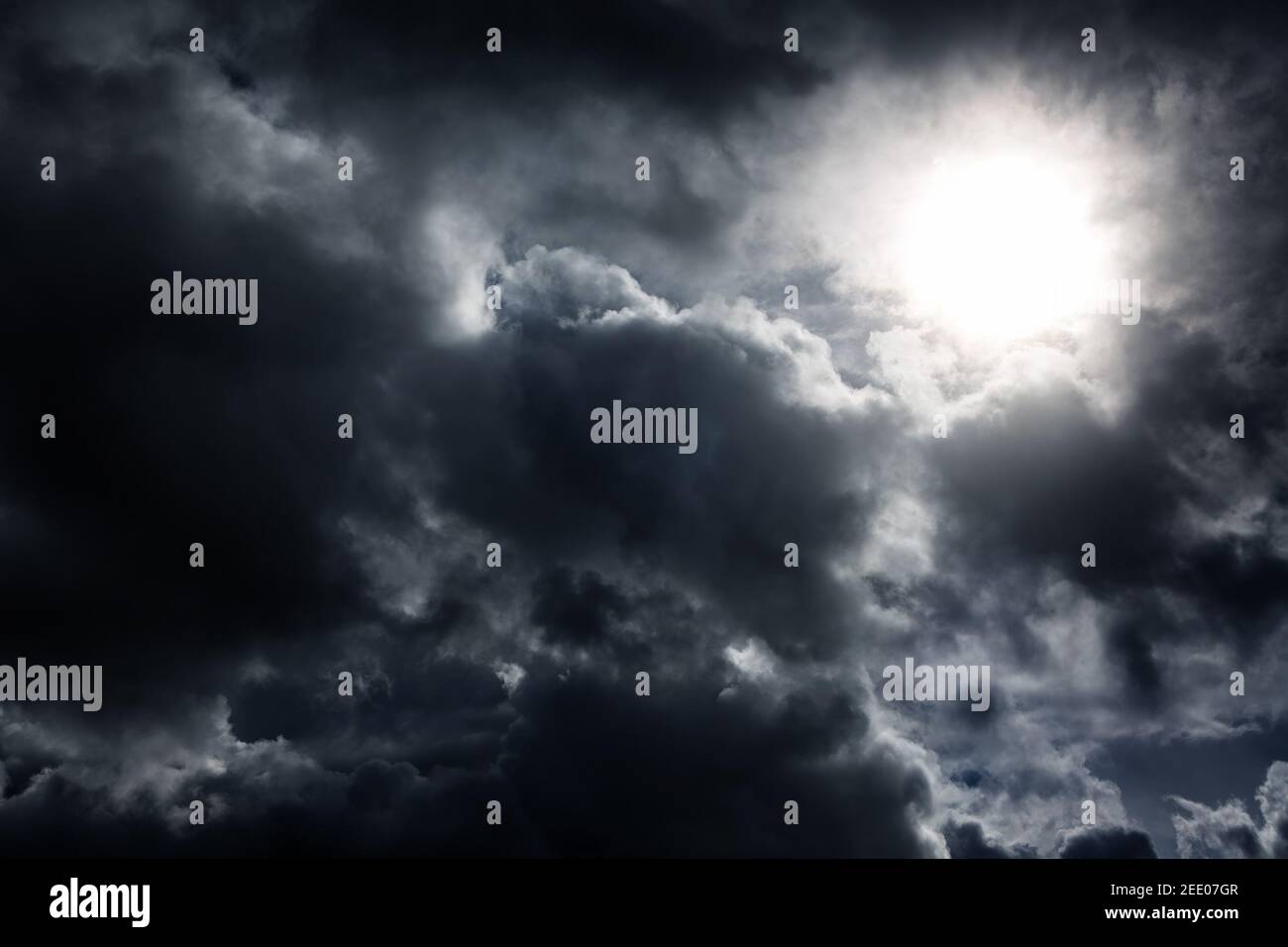 Light in the Dark and Dramatic Storm Clouds Stock Photo - Alamy