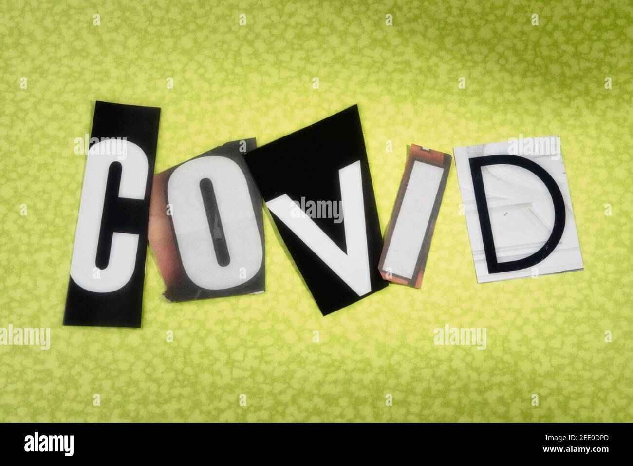 The Word 'COVID' using cut-out paper letters in the ransom note effect typography Stock Photo