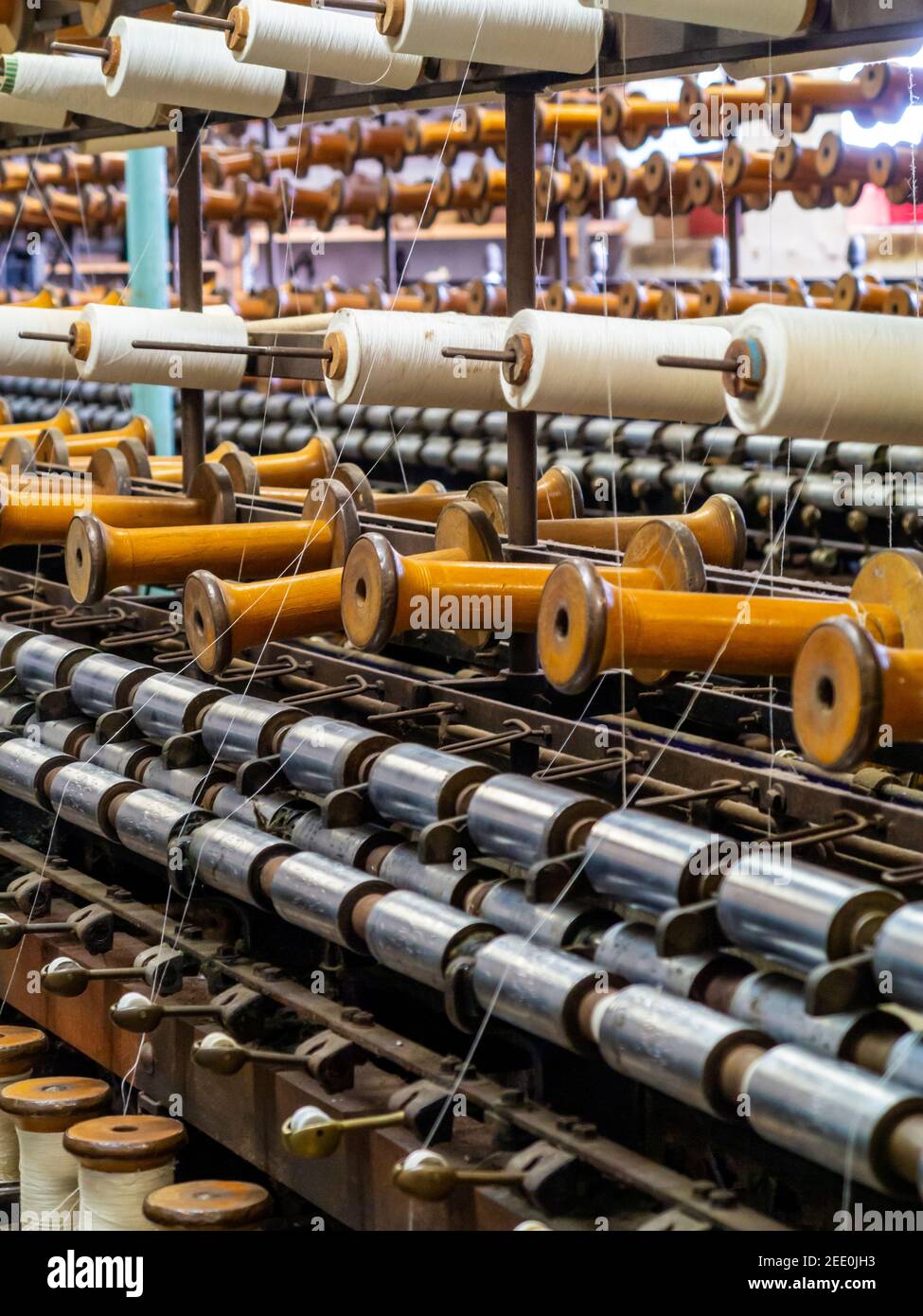 Cotton spinning equipment at Masson Mill in Matlock Bath a village in Derbyshire Dales Peak District England UK formerly a textiles mill. Stock Photo