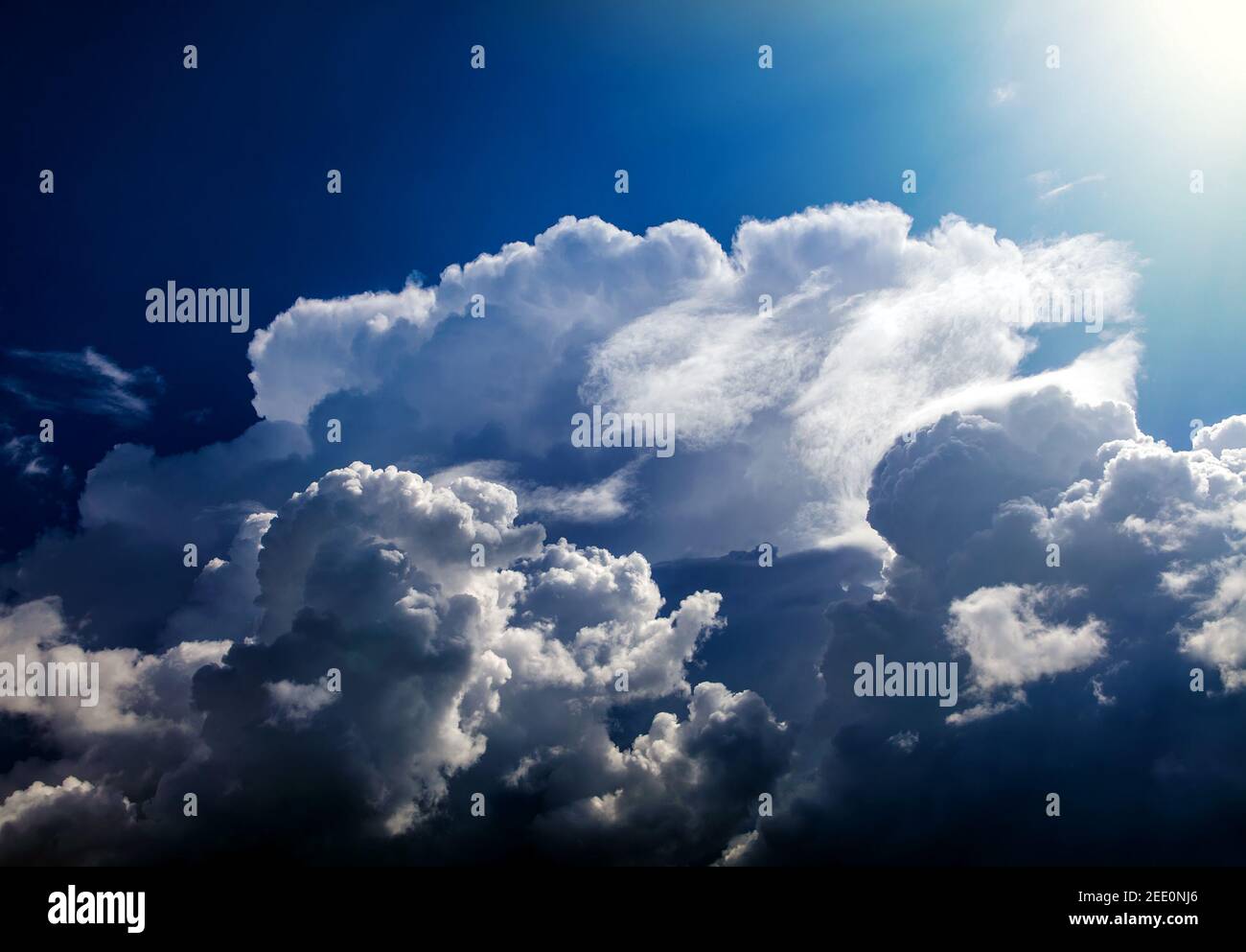 Cloudscape Background with Sun and Blue Sky Stock Photo - Alamy