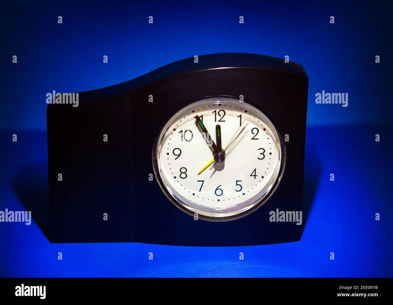 Clock in the Dark Room with display Almost Midnight Stock Photo Alamy