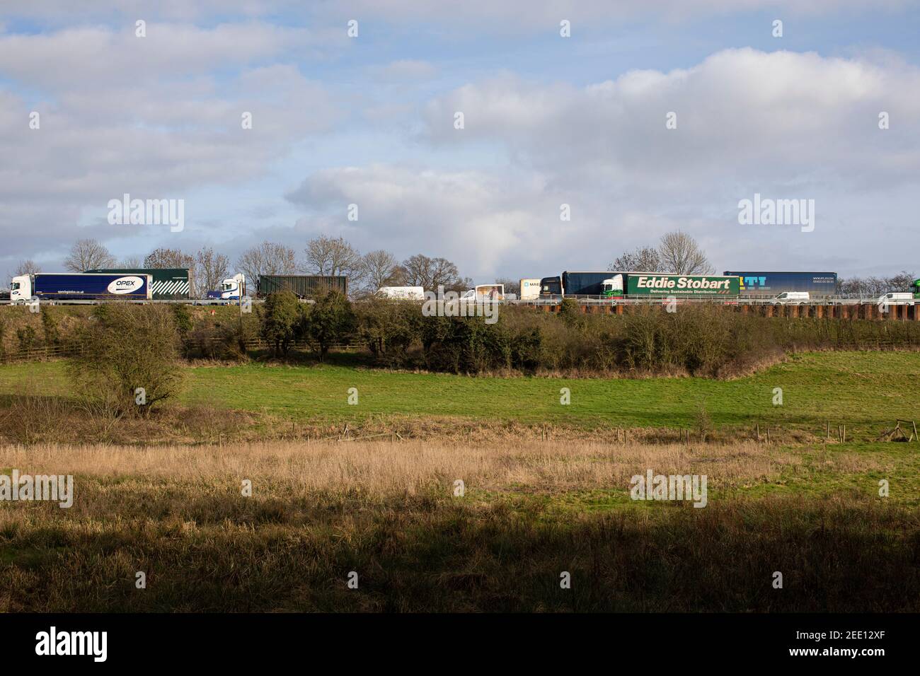Stationary heavy goods vehicles in traffic jams on the M6 motorway in Staffordshire Stock Photo