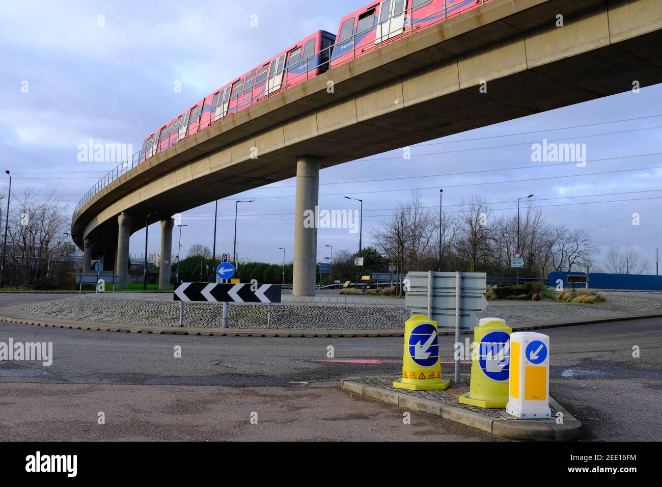 LONDON - 15TH FEBRUARY 2021: Docklands Light Railway train between Royal Albert and Prince Regent stations. Stock Photo