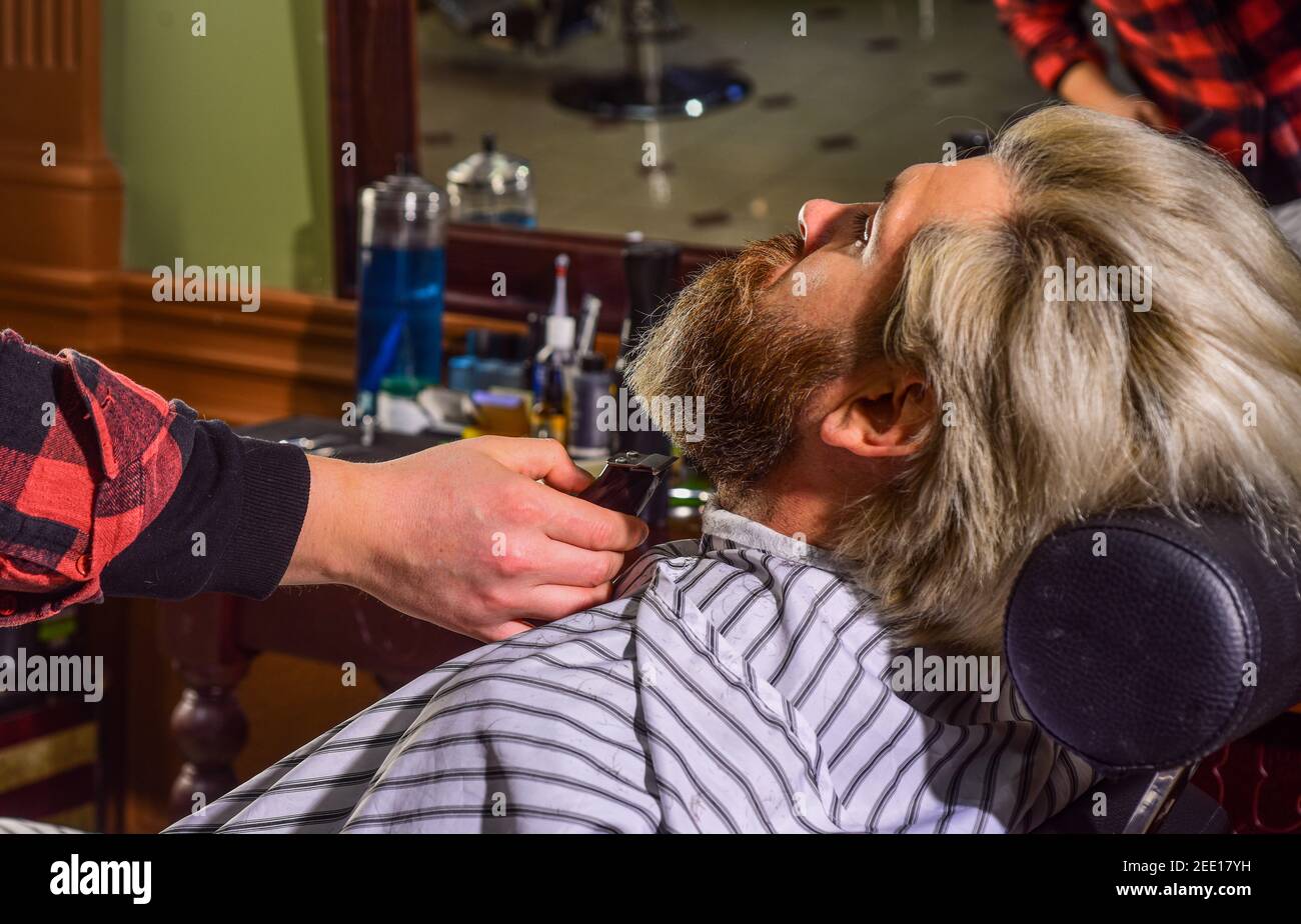 Maintaining beard shape. Grow beard and mustache. Man at