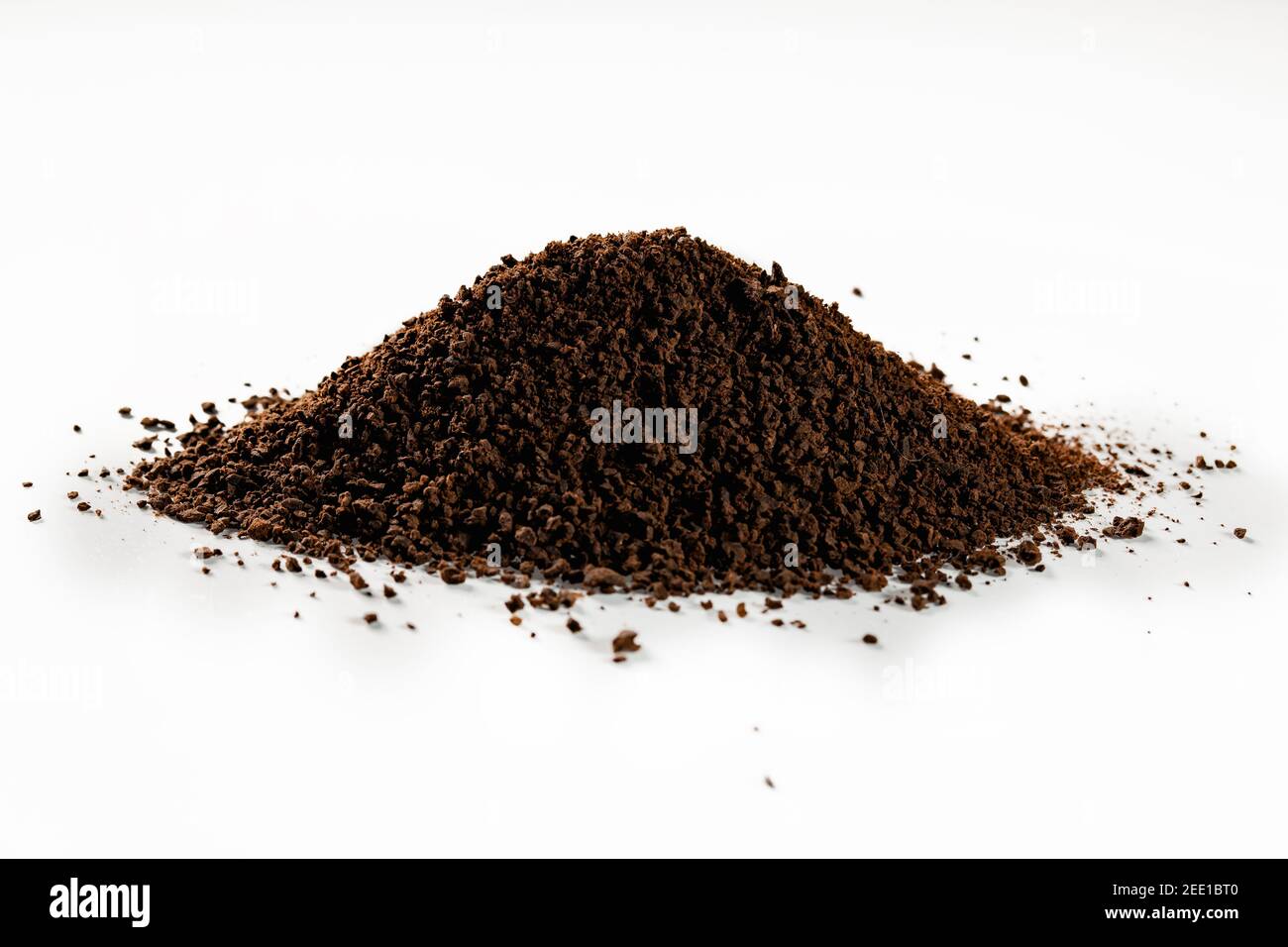 Roasted coffee ground on isolated white background Stock Photo