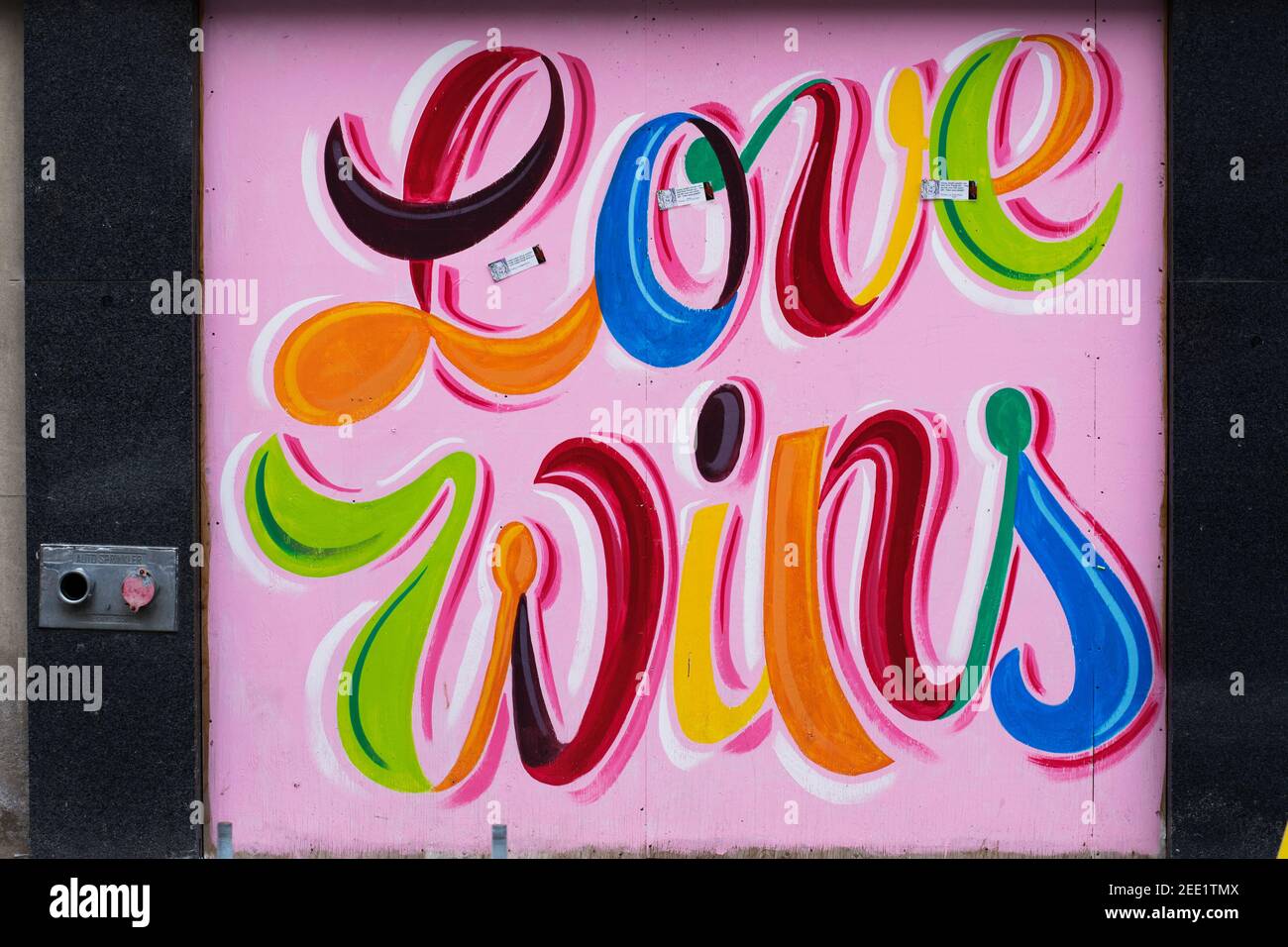 Downtown painting murals in London Ontario, completed by Rich Denomme