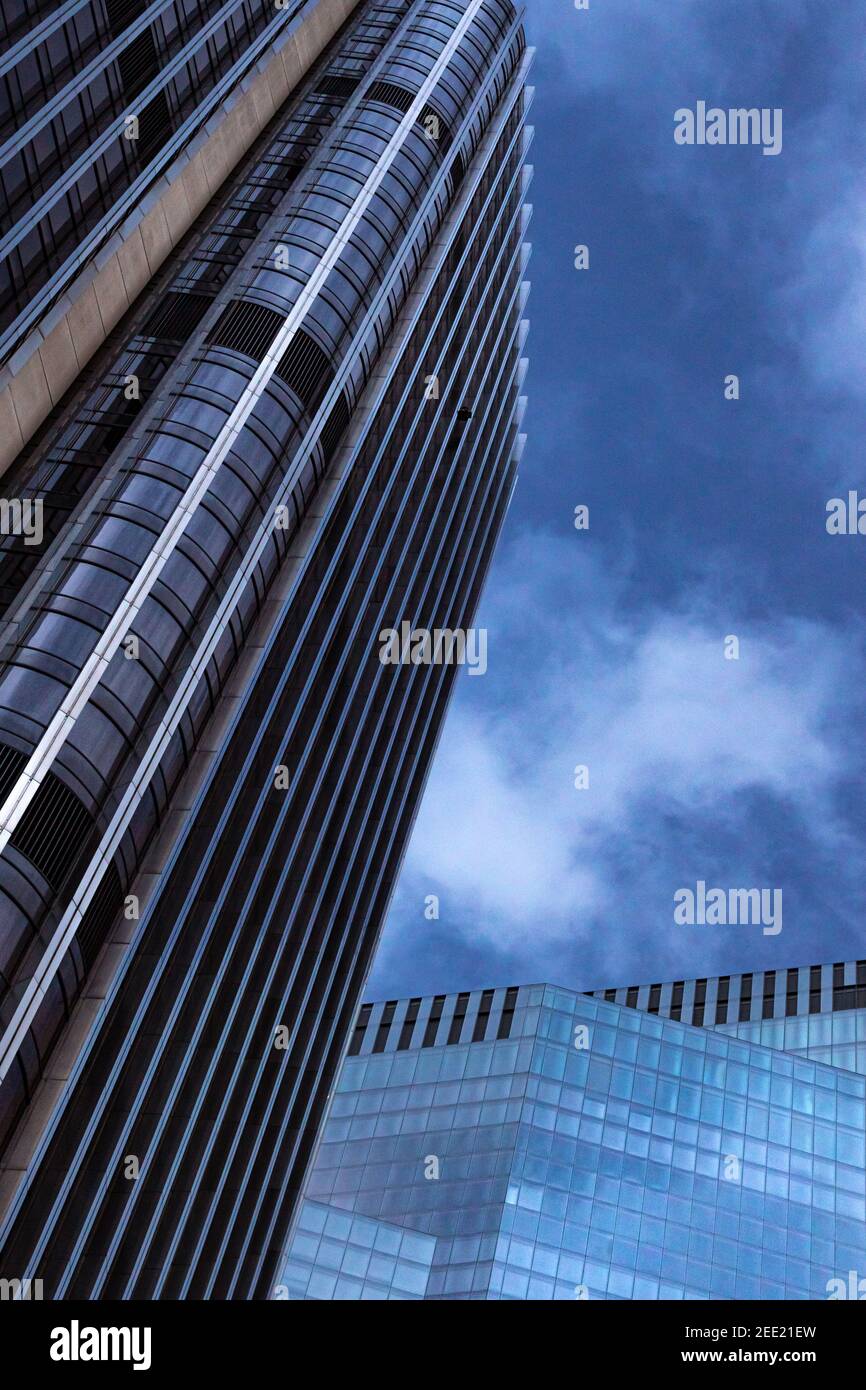 An abstract view looking up at skyscraper Tower 42 against the sky - Stock Image