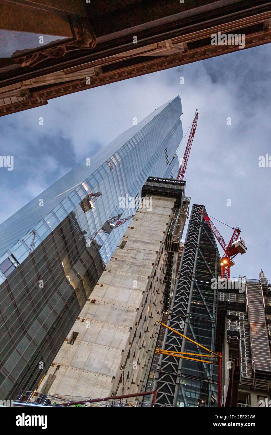 Looking up at construction work of 8 Bishopsgate with skyscraper 22 bishopsgate towering into the sky - Stock Image