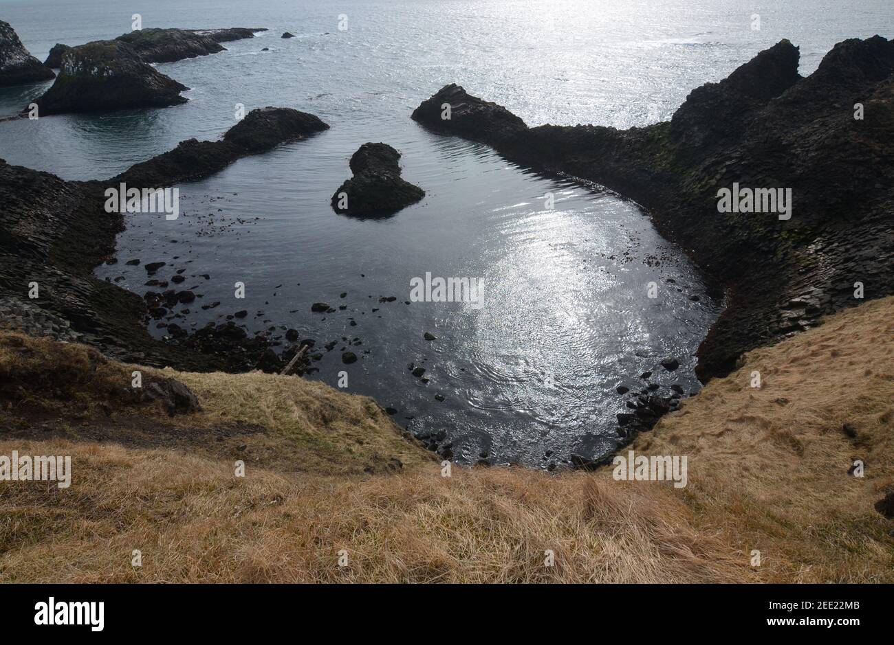 Beautiful black rocks along the coastline of rural Iceland Stock Photo ...