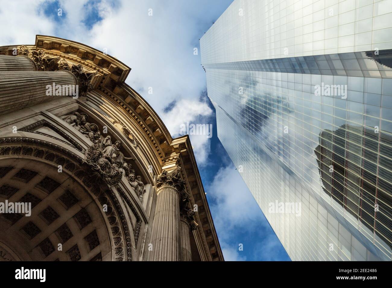 View looking up at 2 financial district buildings seperated by over 150 years of architectural design. Gibson Hall and 22 Bishopsgate Stock Photo