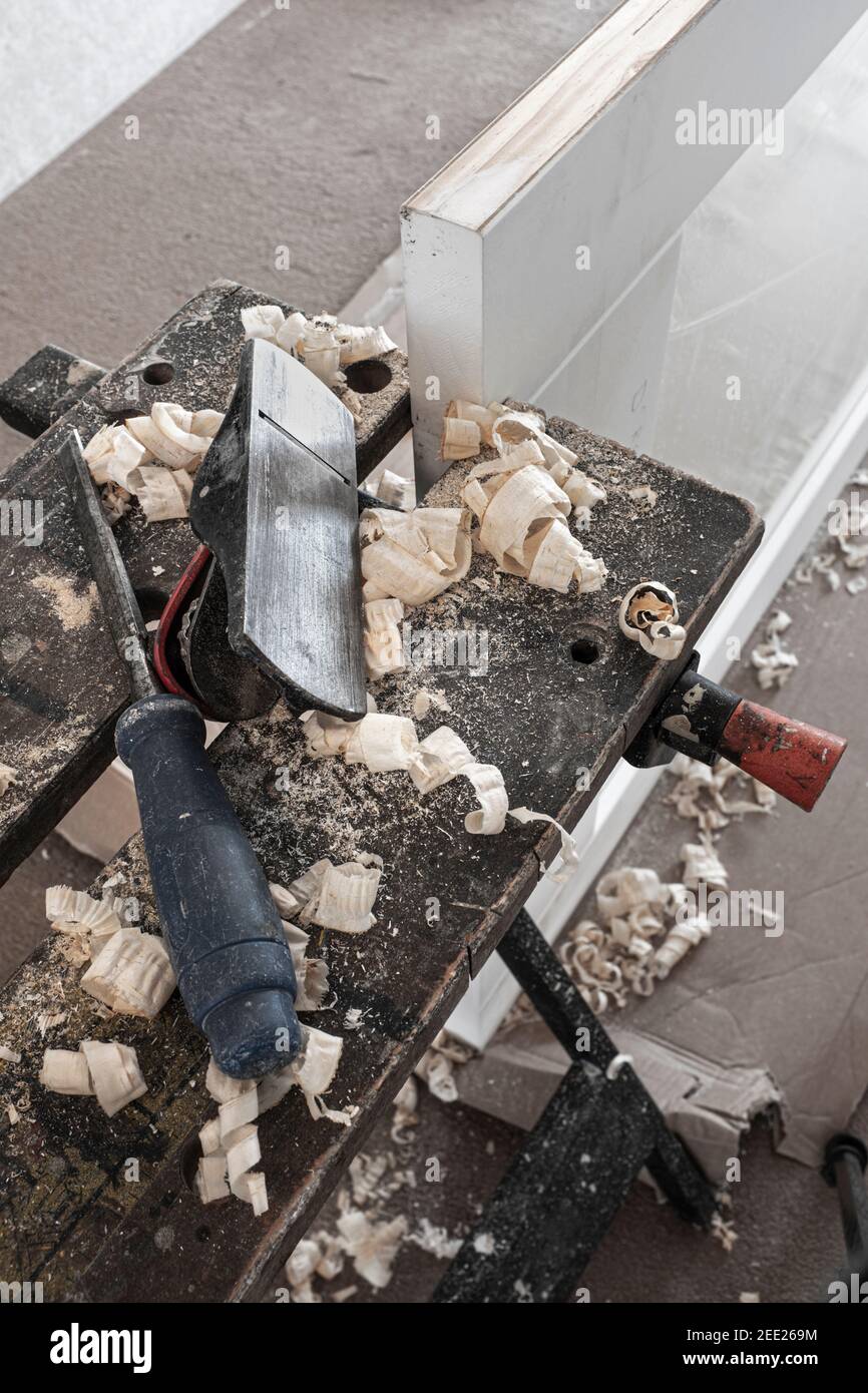 Hand plane and chisel used in fitting an internal door. Stock Photo