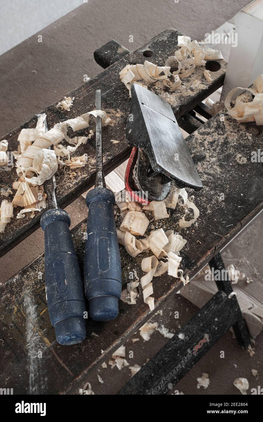 Hand plane and chisels used in fitting an internal door. Stock Photo