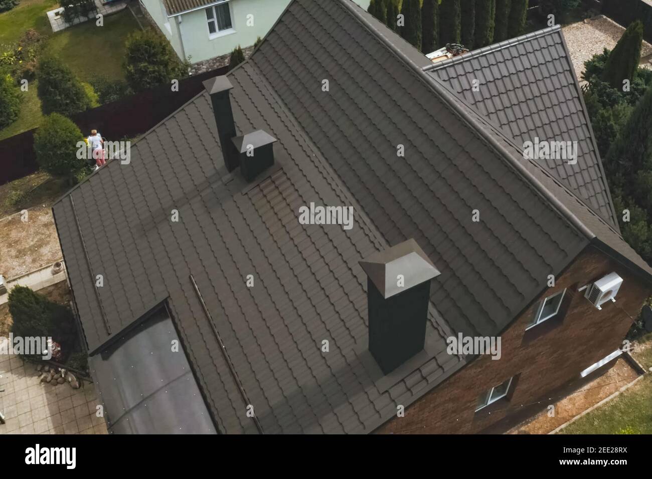 Modern roof made of metal. Corrugated metal roof and metal roofing