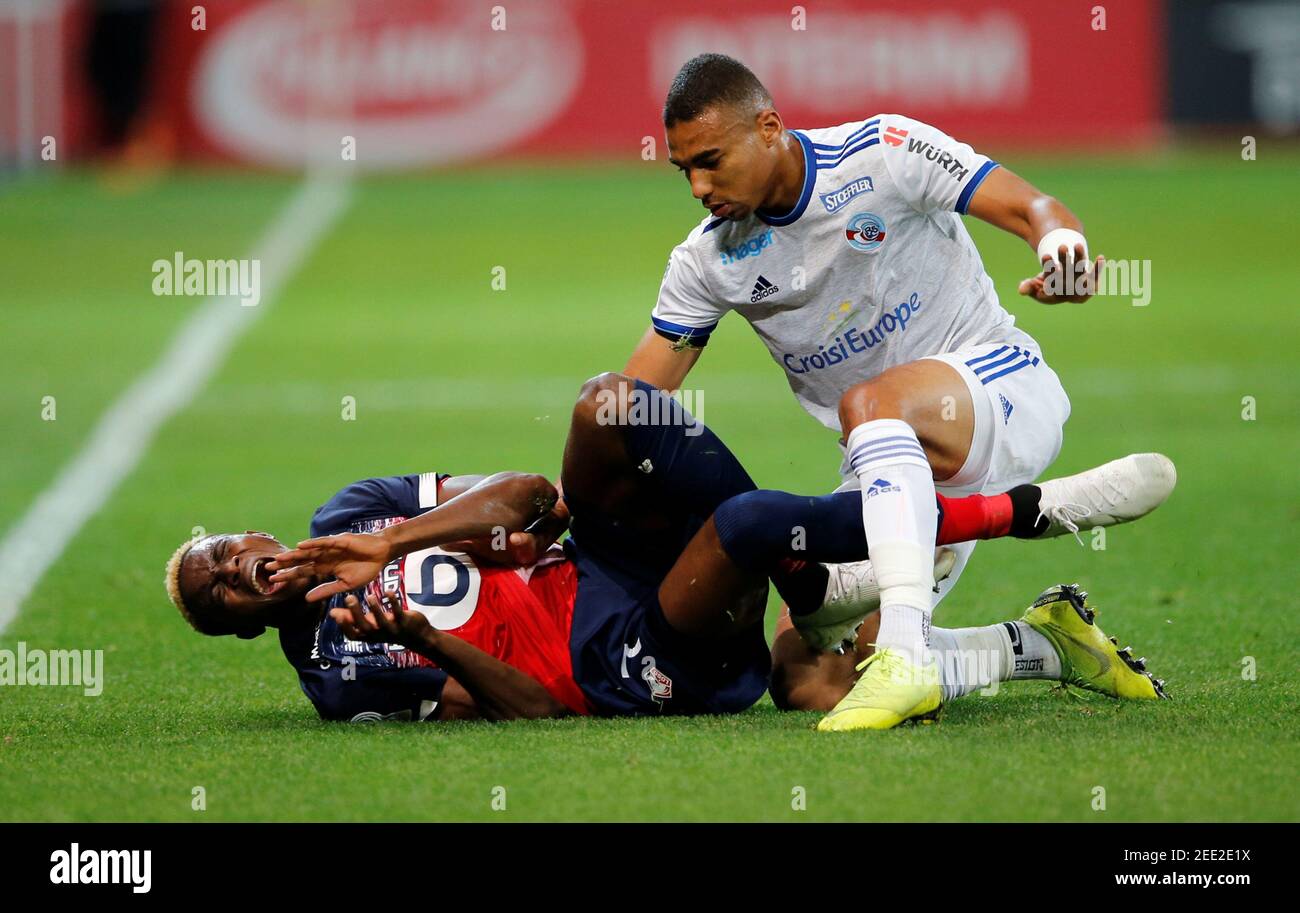 Soccer Football - Ligue 1 - Lille v RC Strasbourg - Stade Pierre-Mauroy,  Lille, France - September 25, 2019 Lille's Victor Osimhen in action with RC  Strasbourg's Alexander Djiku REUTERS/Pascal Rossignol Stock Photo - Alamy