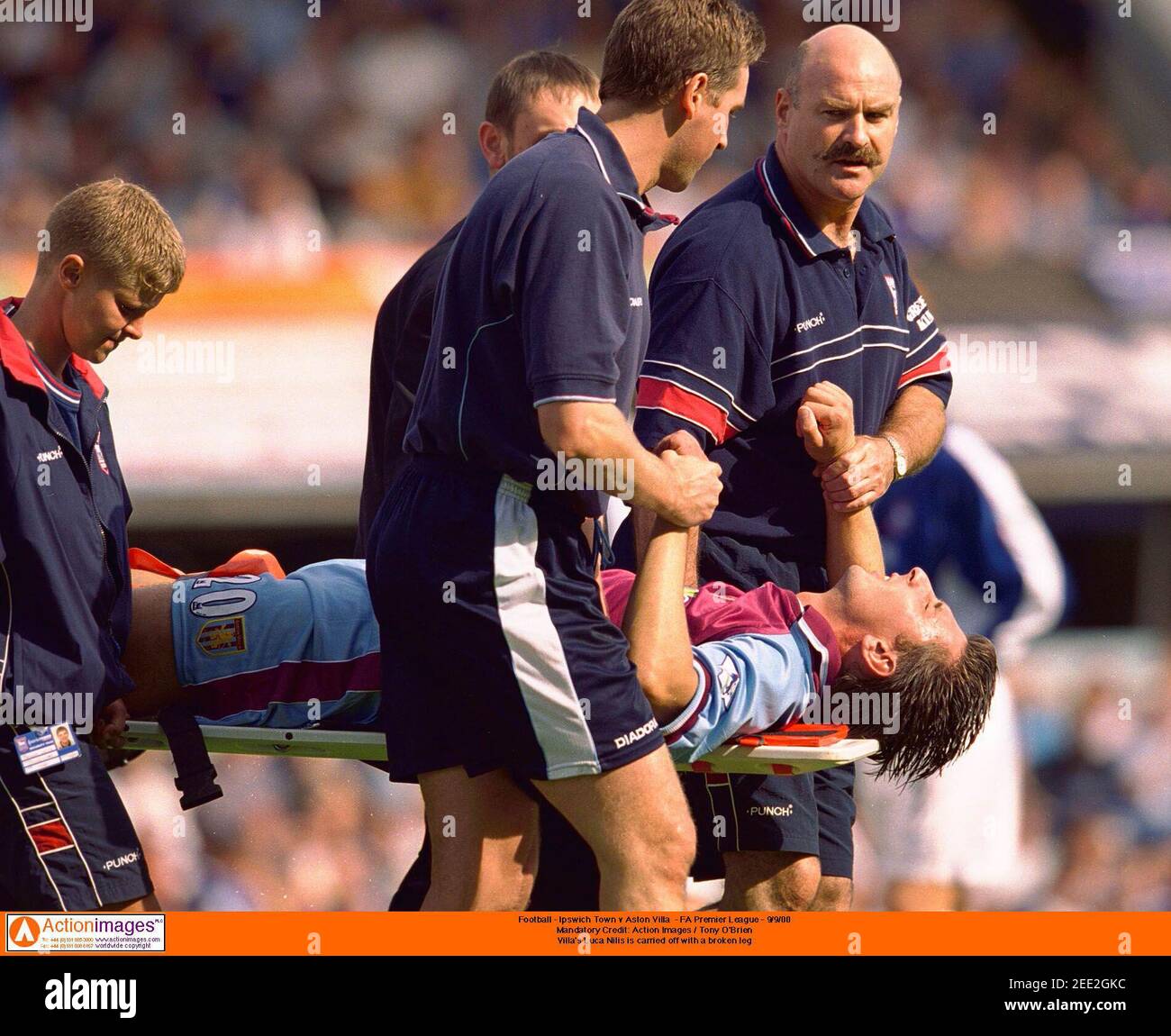 Football - Ipswich Town v Aston Villa - FA Premier League - 9/9/00  Mandatory Credit: Action Images / Tony O'Brien Villa's Luc Nilis is carried  off with a broken leg Stock Photo - Alamy