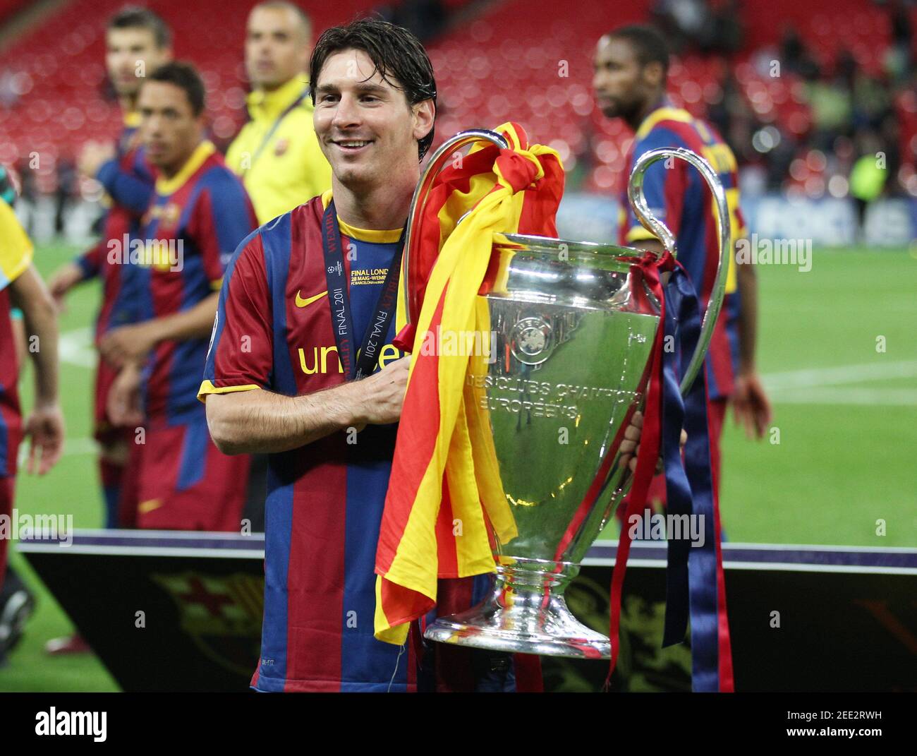 Football - Manchester United v FC Barcelona 2011 UEFA Champions League Final  - Wembley Stadium, London, England - 10/11 - 28/5/11 Barcelona's Lionel  Messi celebrates with trophy after winning the Champions League