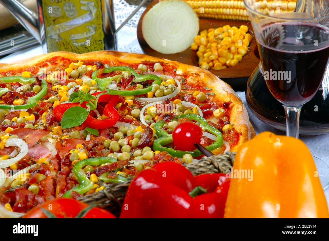 Pizza with corn, bacon, chili, onion, pea Stock Photo Alamy