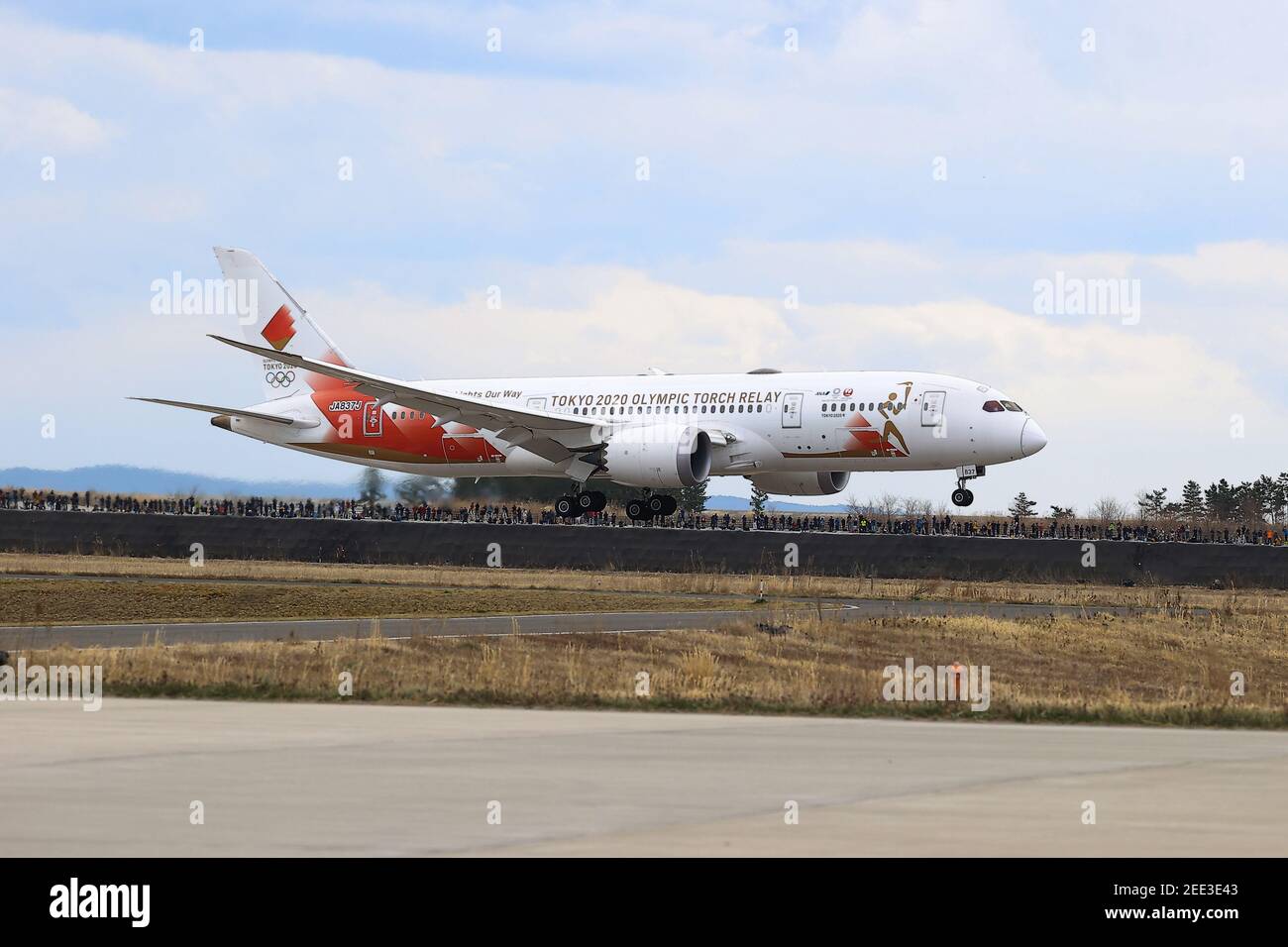 Miyagi, Japan. 20th Mar, 2020. The Torch Special Transport Aircraft 'TOKYO 2020' returned from Athens, Greece to the Air Self-Defense Force's Matsushima Air Base in Miyagi Prefecture to carry the torch. on March 20, 2020 in Miyagi, Japan. The games were originally set to begin July 24, 2020, but they have been delayed due to the Covid-19 pandemic. The games have been tentatively rescheduled for July 23, 2021. (Photo by Kazuki Oishi/Sipa USA)**Japan Out** Credit: Sipa USA/Alamy Live News Stock Photo