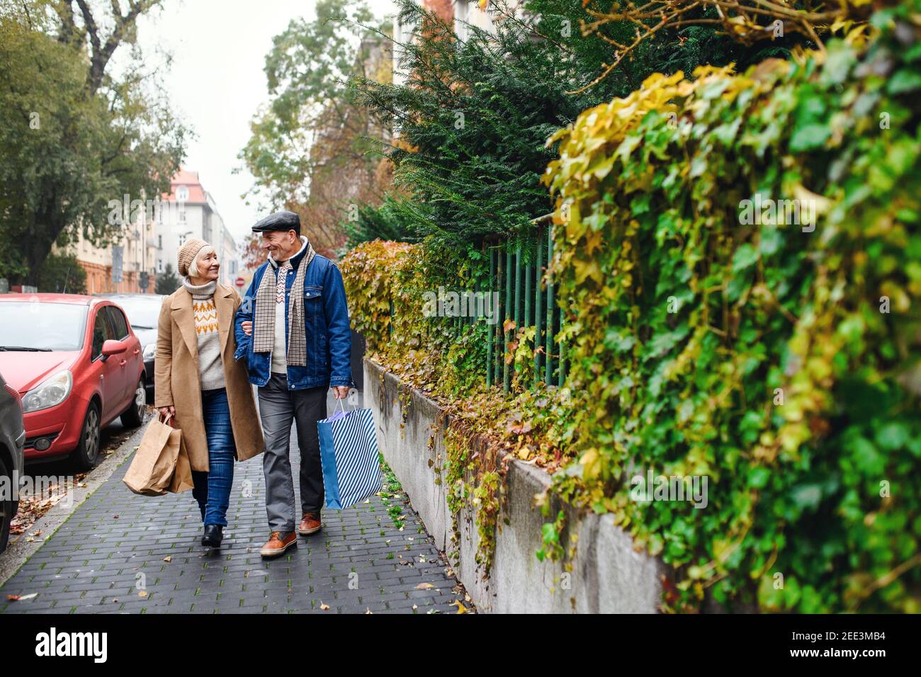 Retired man walking shopping hi-res stock photography and images - Alamy