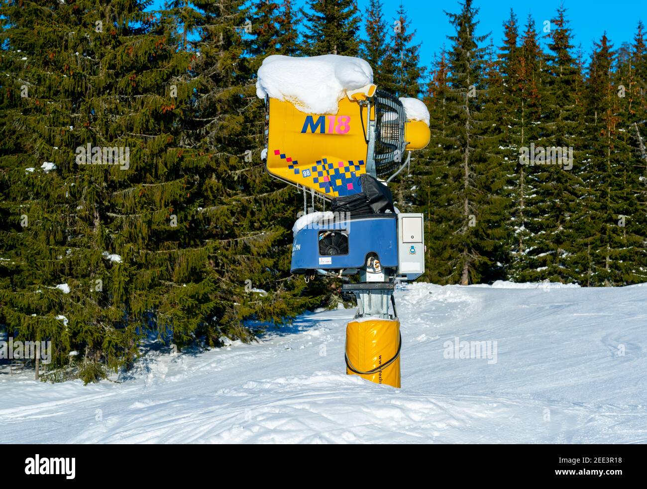 Snow machine at a ski resort on a sunny winters day Stock Photo Alamy