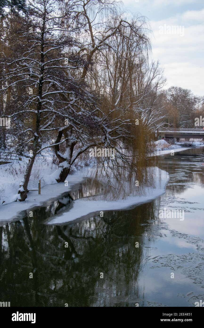 Onset of winter in Bünde. Everything is covered in deep snow. Here the  river Else Stock Photo - Alamy