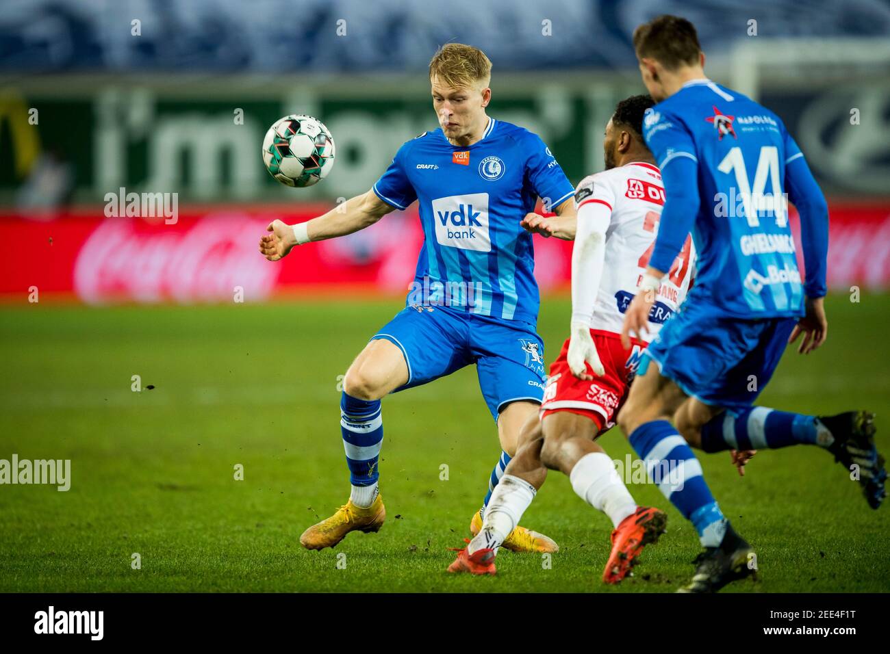 Gent's Andreas Hanche Olsen and Mouscron's Enes Saglik fight for the ball during a soccer match between KAA Gent and Royal Excel Mouscron, Monday 15 F Stock Photo
