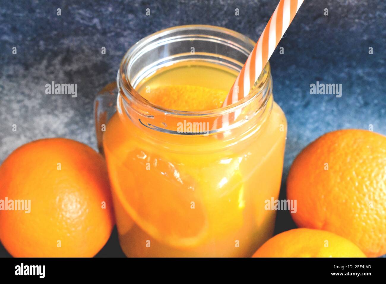 Homemade orange juice and oranges in a jar Stock Photo Alamy