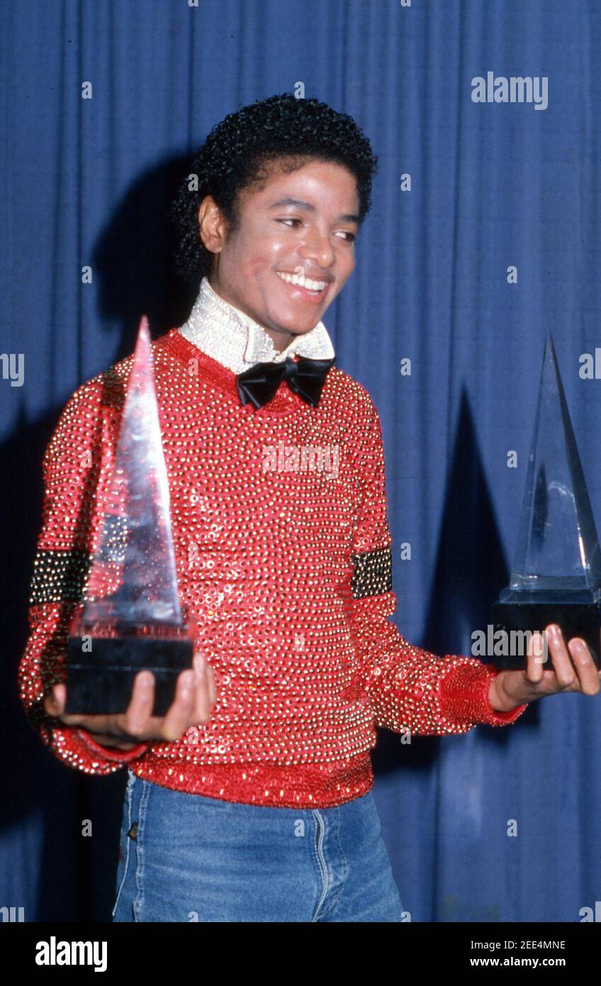 michael-jackson-carries-the-two-american-music-awards-he-won-for-his-album-off-the-wall-they-are-for-favorite-male-vocalist-soul-and-rb-and-favorite-album-soul-and-rb-los-angeles-january-30-1981-credit-ralph-dominguezmediapunch-2EE4MNE.jpg