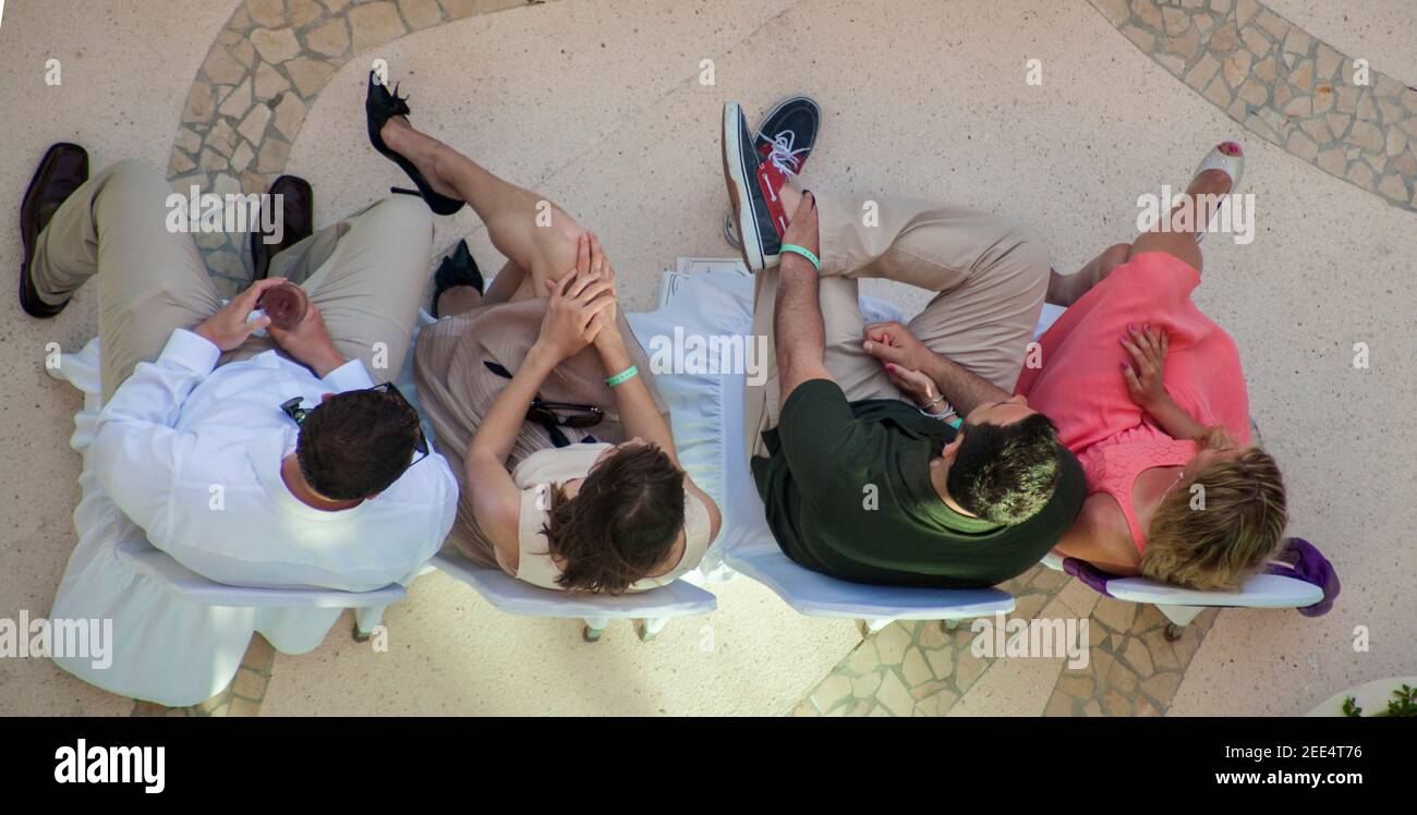 People seated viewed from above Stock Photo