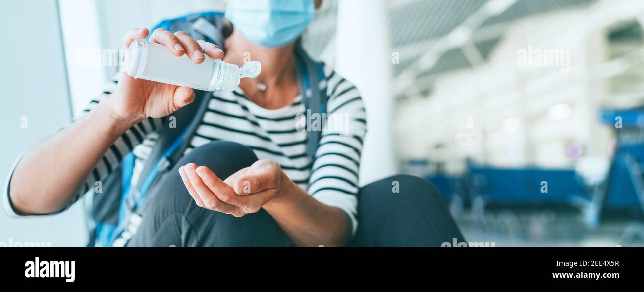 Female traveler with backpack sitting in airport passenger transfer