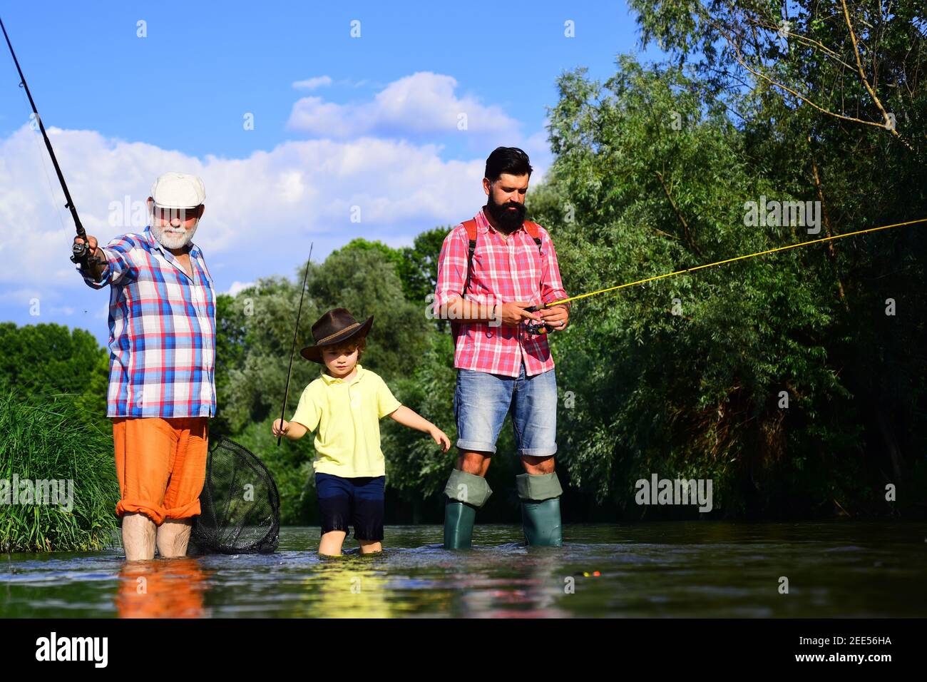 Vintage boy and father fishing hi-res stock photography and images - Alamy
