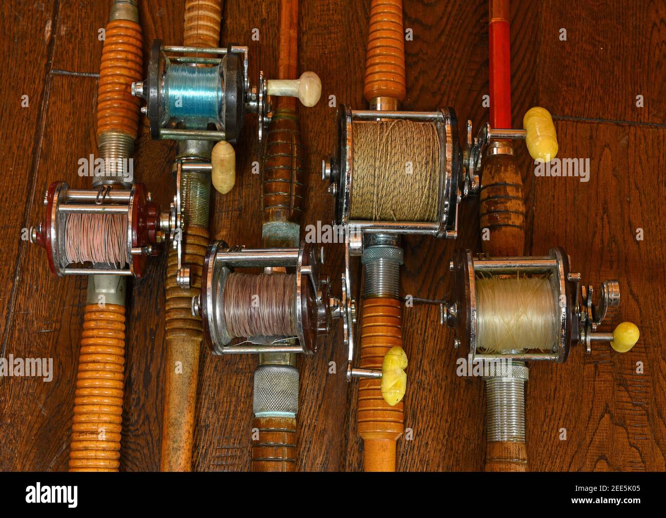 Vintage bamboo fishing rods and conventional reels Stock Photo