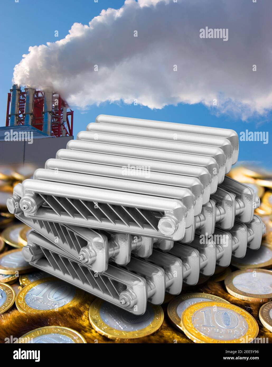 Stacked sections of cast iron heating radiators lie on surface of ...