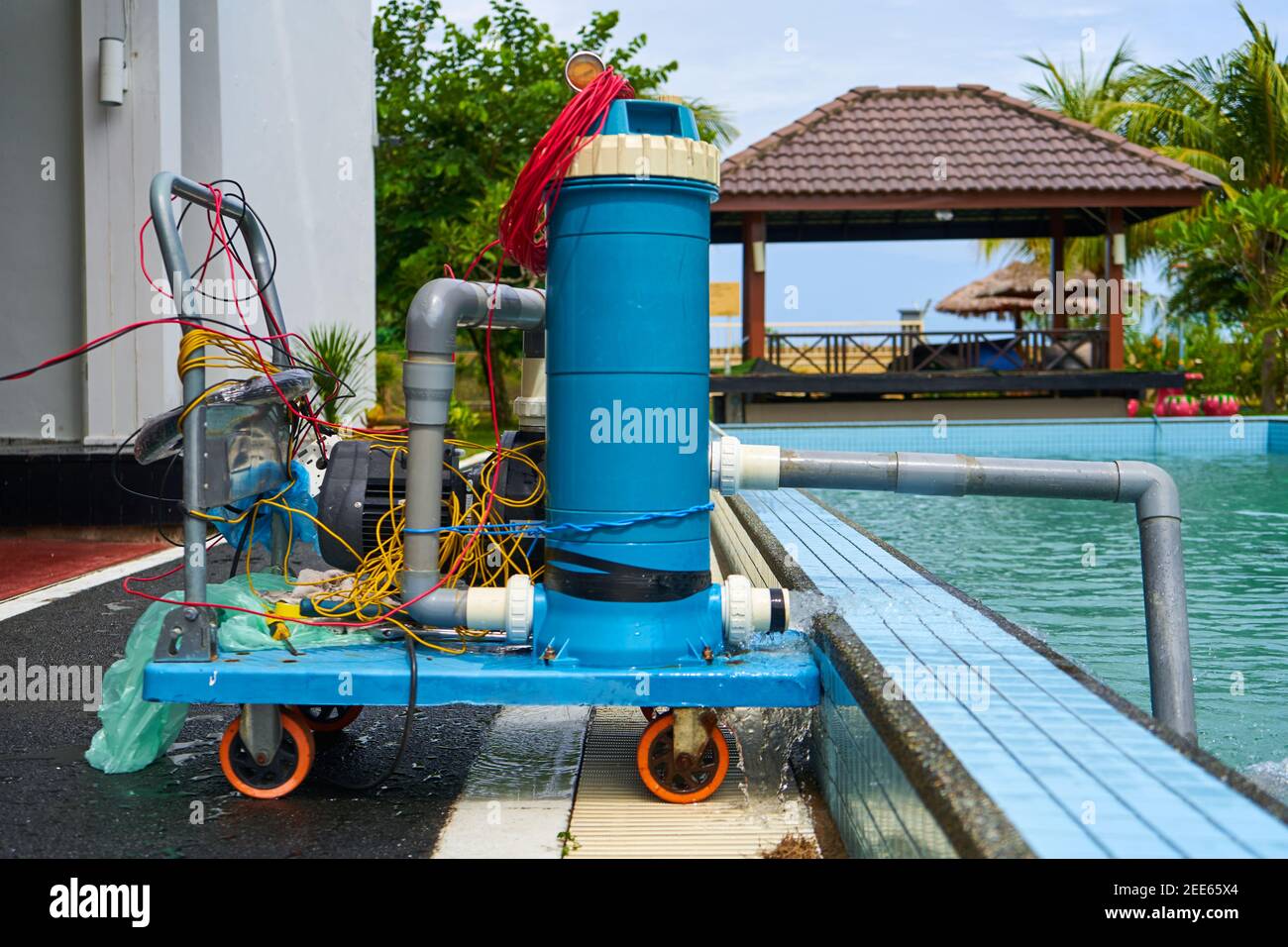 A filter pump cleans the pool water. Device for automatic cleaning of