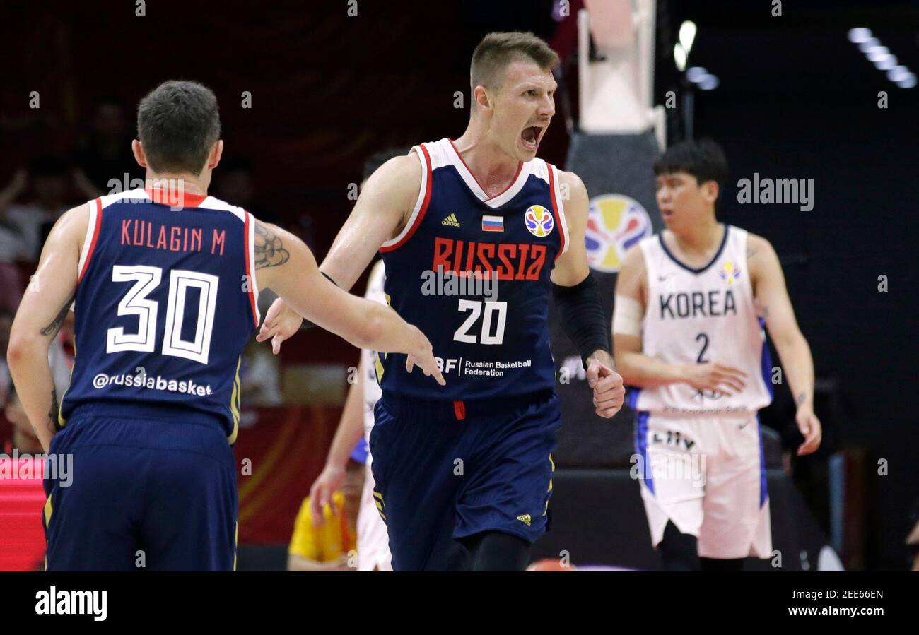 Basketball - FIBA World Cup - First Round - Group B - South Korea v Russia - Wuhan Sports Centre, Wuhan, China - September 2, 2019 Russia's Andrey Vorontsevich reacts during the match as Mikhail Kulagin looks on REUTERS/Jason Lee Stock Photo
