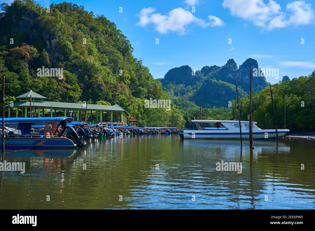 Boat river pier on tropical island Langkawi. Stock Photo