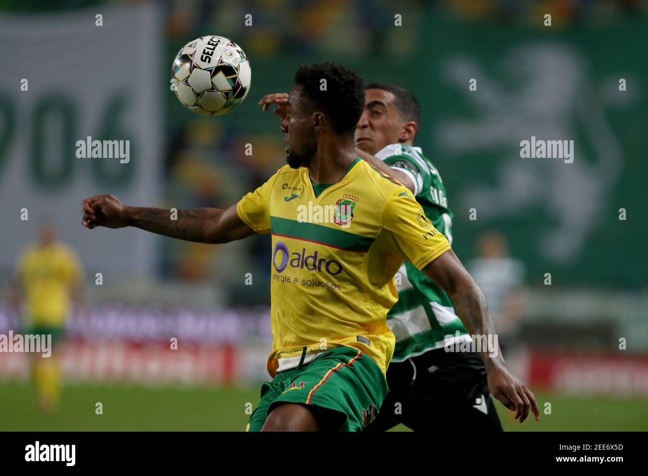 Lisbon, Portugal. 15th Feb, 2021. Maracas of FC Pacos Ferreira (L) vies with Tiago Tomas of Sporting CP during the Portuguese League football match between Sporting CP and FC Pacos de Ferreira at Jose Alvalade stadium in Lisbon, Portugal on February 15, 2021. Credit: Pedro Fiuza/ZUMA Wire/Alamy Live News Stock Photo