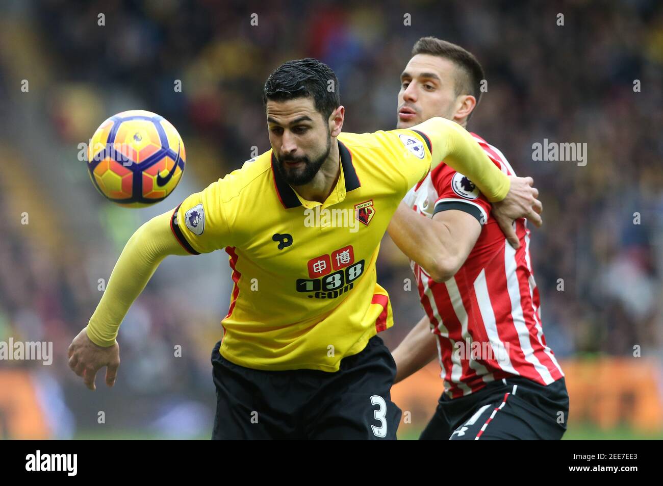 Britain Soccer Football - Watford v Southampton - Premier League - Vicarage Road - 4/3/17 Watford's Miguel Britos in action with Southampton's Dusan Tadic  Reuters / Paul Hackett Livepic EDITORIAL USE ONLY. No use with unauthorized audio, video, data, fixture lists, club/league logos or 'live' services. Online in-match use limited to 45 images, no video emulation. No use in betting, games or single club/league/player publications.  Please contact your account representative for further details. Stock Photo