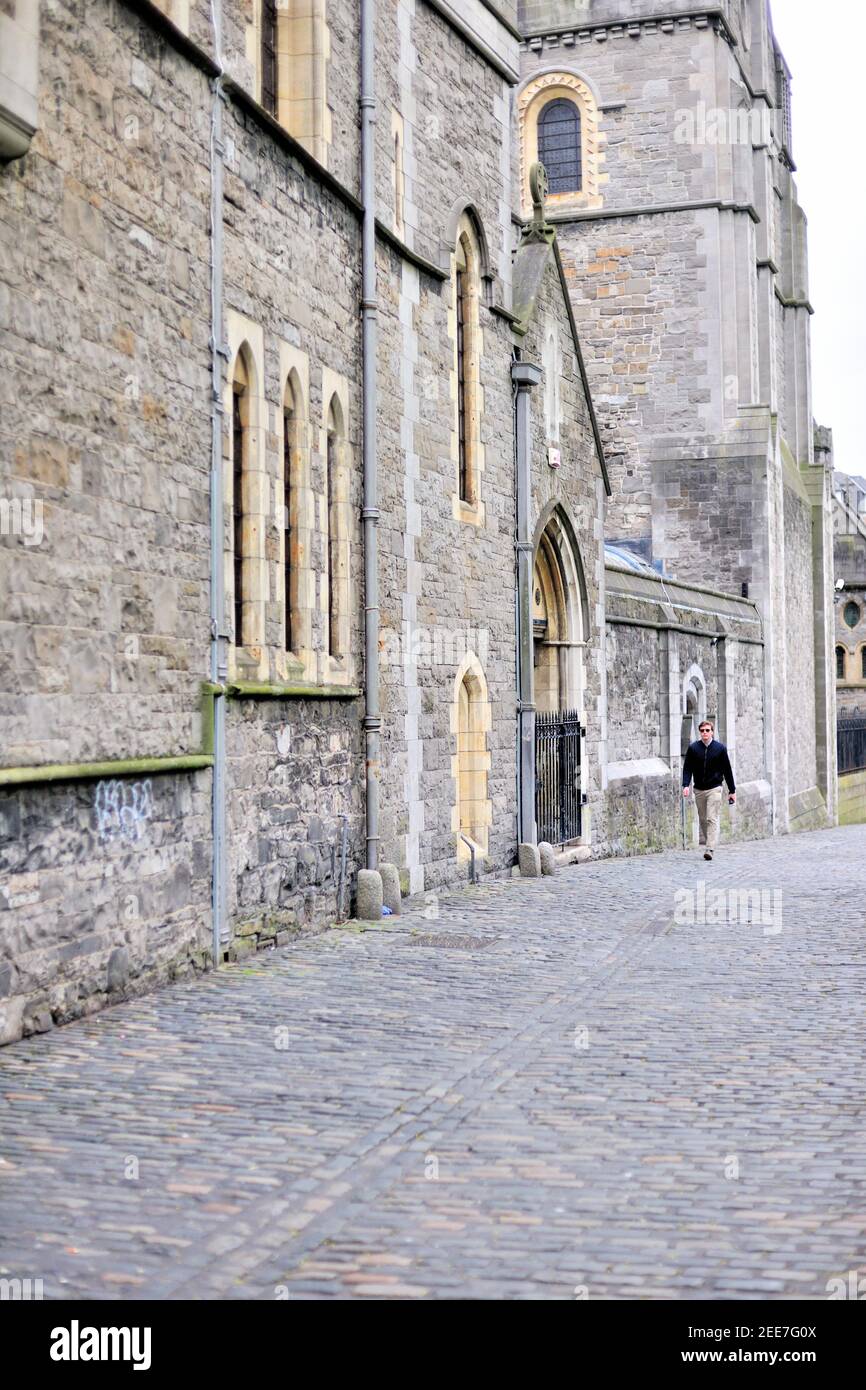 Dublin, Ireland. Ancient walkway along side Christ Church Cathedral. The cathedral dates back to 1186. Stock Photo