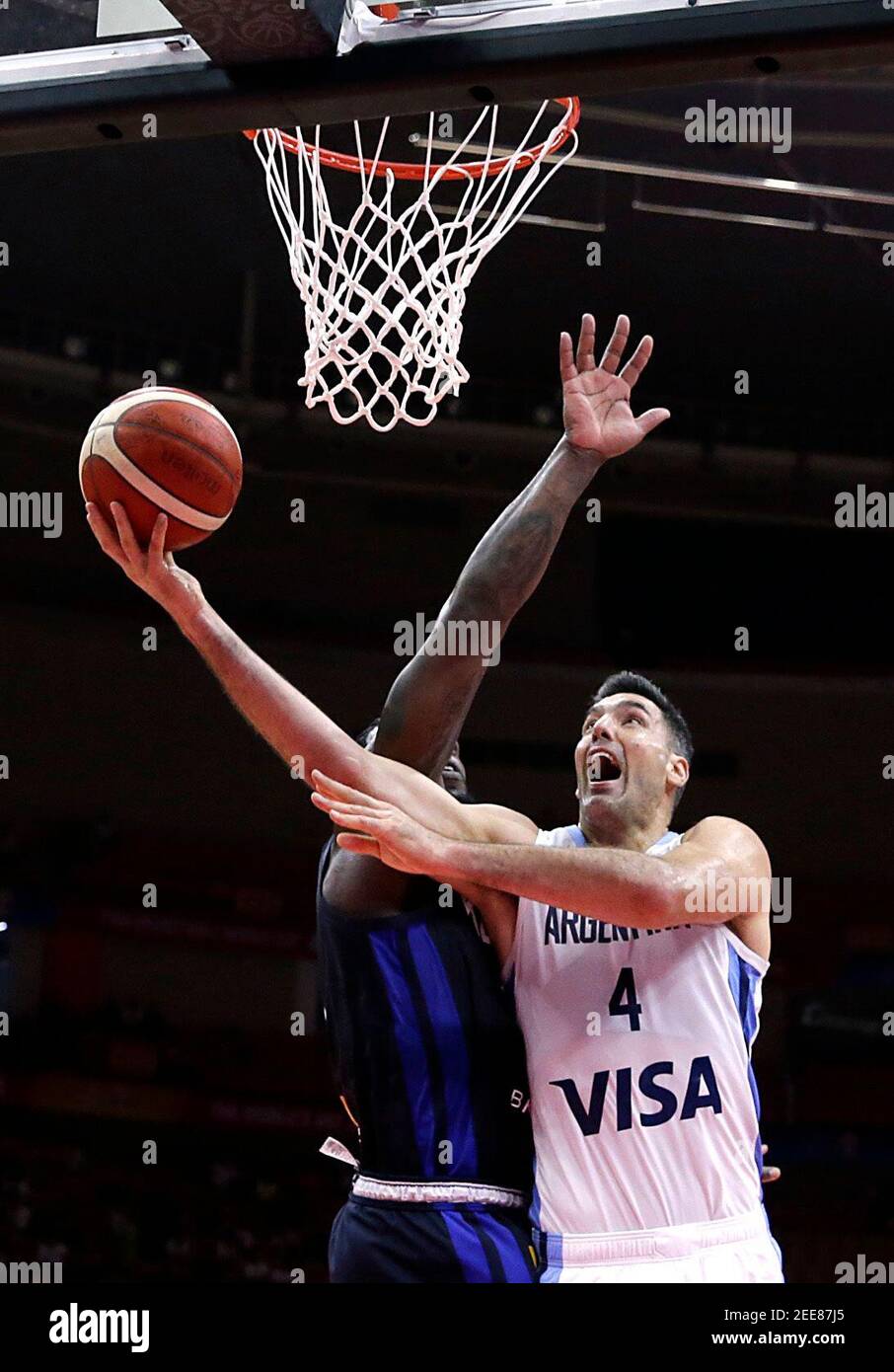 Basketball - FIBA World Cup - First Round - Group B - Argentina v South Korea - Wuhan Sports Center, Wuhan, China - August 31, 2019 Argentina's Luis Scola in action with South Korea's Guna Ra REUTERS/Jason Lee Stock Photo
