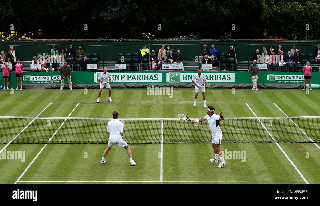 Tennis - BNP Paribas Tennis Classic - The Hurlingham Club, London - 22/6/13  Men's Doubles - Former tennis players (L to R) Peter McNamara, Jeremy Bates  vs Andrew Castle, Pat Cash in