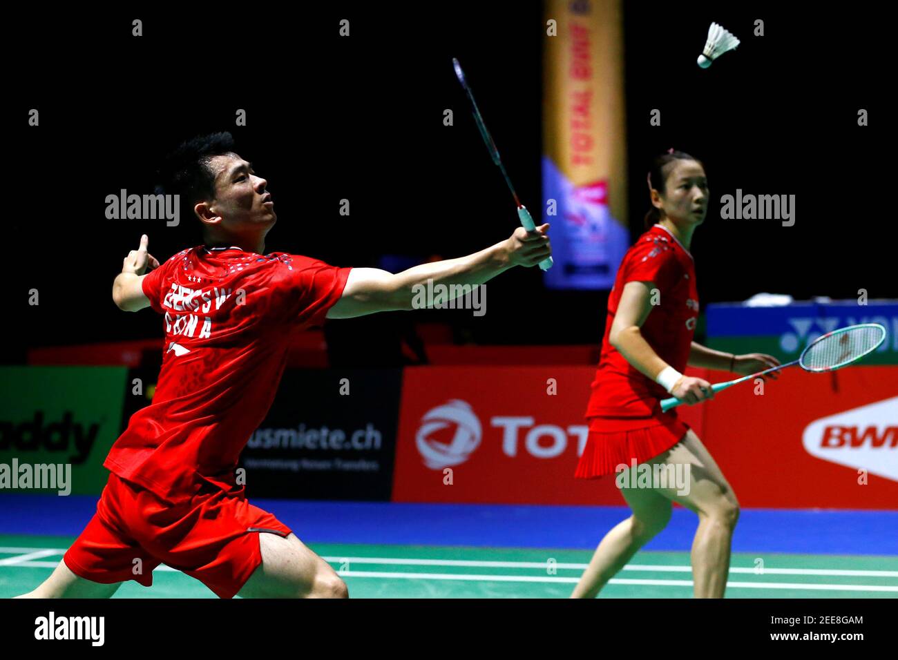 2019 Badminton World Championships - St. Jakobshalle Basel, Basel,  Switzerland - August 22, 2019 China's Zheng Si Wei and Huang Ya Qiong in  action during their third round mixed doubles match against