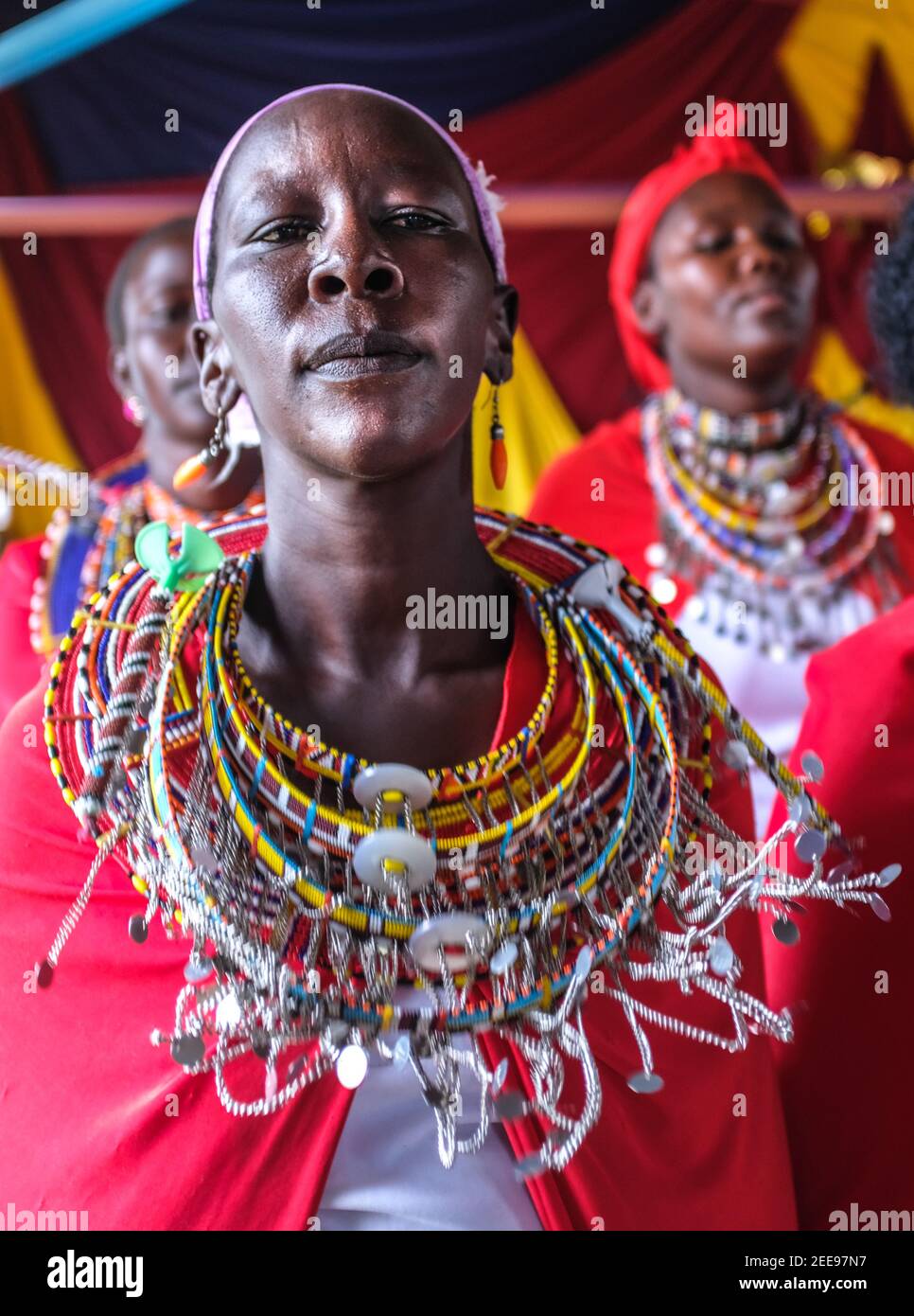 Nairobi, Kenya. 14th Feb, 2021. Maasai woman dressed in her Colorful dress is seen performing a traditional dance and traditional songs during a Sunday Church Service at Olekimunke Methodist Church in Kajiado. Credit: SOPA Images Limited/Alamy Live News Stock Photo