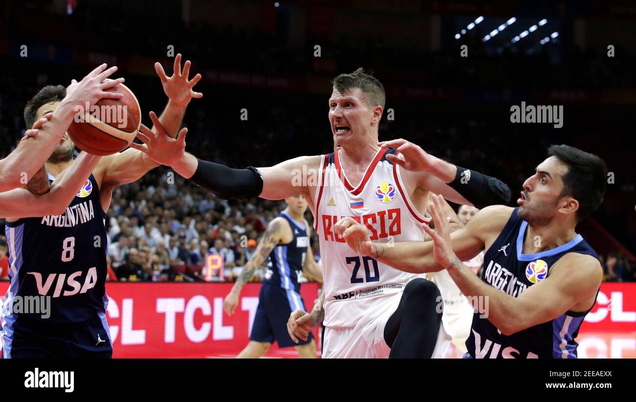 Basketball - FIBA World Cup - First Round - Group B - Russia v Argentina - Wuhan Sports Centre, Wuhan, China - September 4, 2019 Russia's Andrey Vorontsevich in action with Argentina's Nicolas Laprovittola and Facundo Campazzo REUTERS/Jason Lee Stock Photo