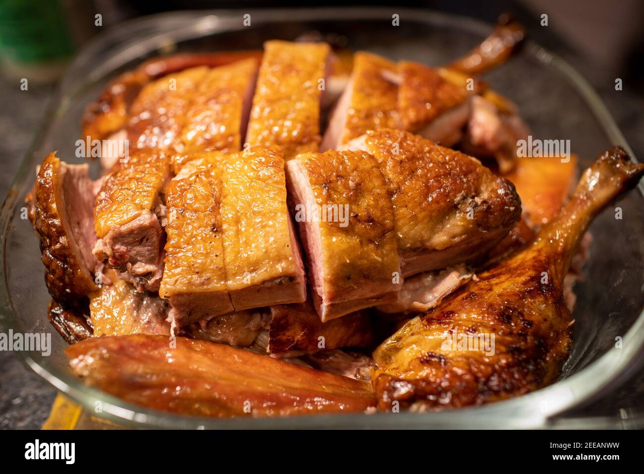 Homemade crispy roasted duck marinated with spices and baked in oven
