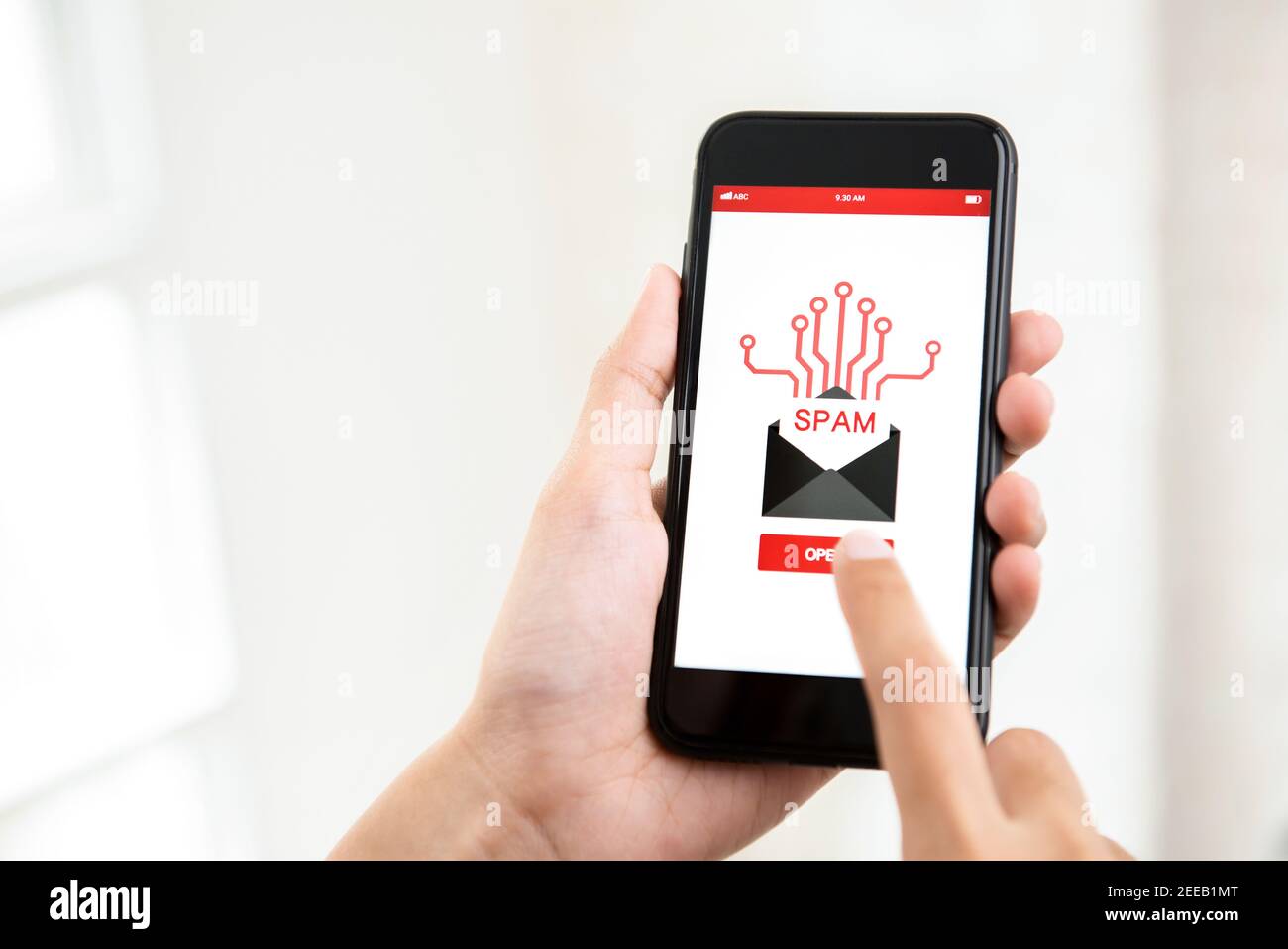 Spam or virus notification email alerted on mobile phone screen - cyberattack concept Stock Photo