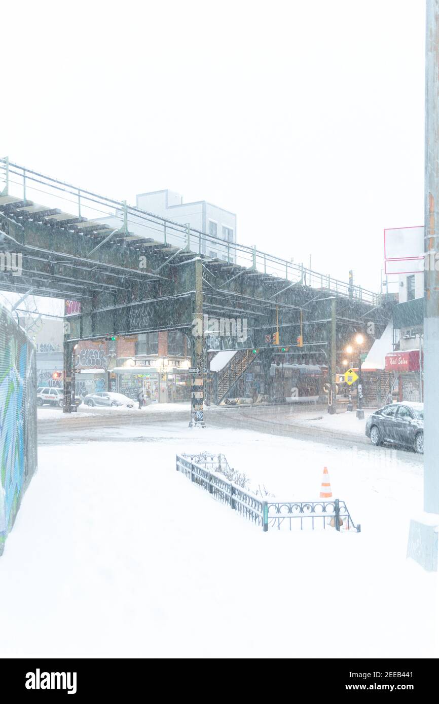 A City Street with an Elevated Train is in Almost Whiteout Conditions. The snow is falling so fast that the city street is almost completely invisible. Stock Photo