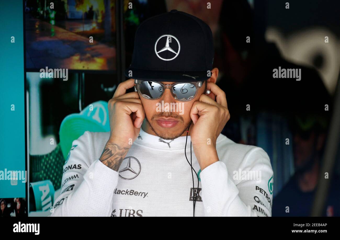 Formula One - F1 - Malaysian Grand Prix 2015 - Sepang International Circuit, Kuala Lumpur, Malaysia - 28/3/15  Mercedes' Lewis Hamilton in the garage before qualifying  Reuters / Olivia Harris  Livepic Stock Photo