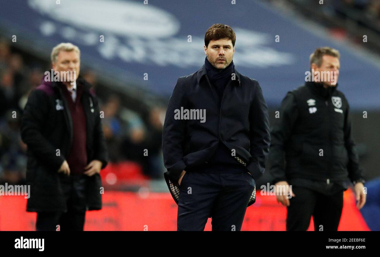 Soccer Football - Premier League - Tottenham Hotspur vs West Ham United - Wembley Stadium, London, Britain - January 4, 2018   Tottenham manager Mauricio Pochettino, West Ham United manager David Moyes and assistant manager Stuart Pearce   REUTERS/Eddie Keogh    EDITORIAL USE ONLY. No use with unauthorized audio, video, data, fixture lists, club/league logos or 'live' services. Online in-match use limited to 75 images, no video emulation. No use in betting, games or single club/league/player publications.  Please contact your account representative for further details. Stock Photo