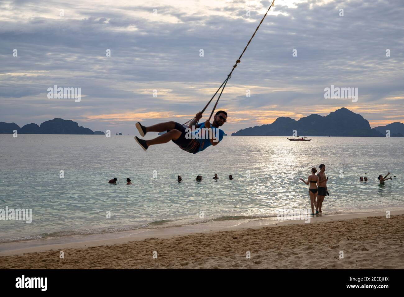 El Nido, the Philippines 20 Nov 2018 Sunset sea landscape with man